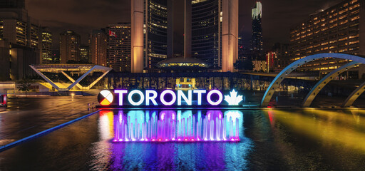 Toronto Sign and Fountain in Downtown Toronto, Ontarior, Canada. Night