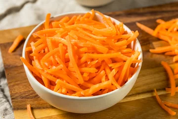 Fototapeten Organic Raw Shredded Carrot Shreds © Brent Hofacker