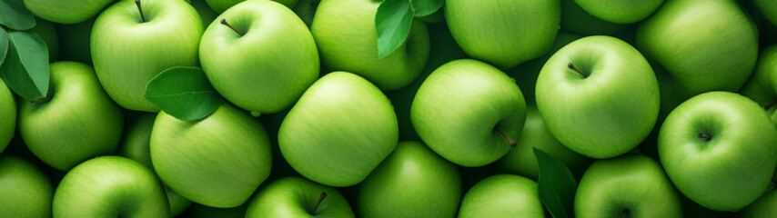 Green Apples Piled Together in Full Frame with a Lush Background - obrazy, fototapety, plakaty