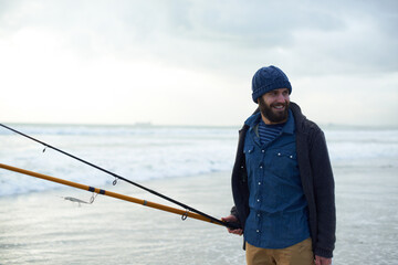 Relax, fishing and man walking on beach with rods, nature and outdoor holiday adventure. Ocean,...