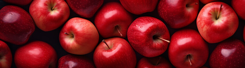 Red Apples Piled High with a Deep Shadow Background - obrazy, fototapety, plakaty