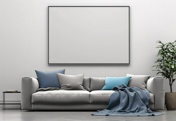 A modern living room with a gray sofa next to a white wall with an empty poster layout