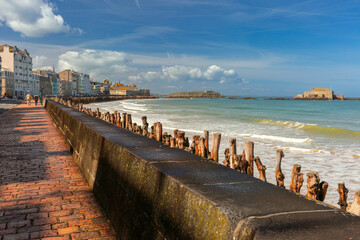 Sunny aerial view of beautiful walled port city of Saint-Malo at high tide, Brittany, France