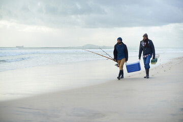 Friends, fishing and men walking on beach together with cooler, tackle box and holiday mockup...