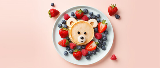 Pancake Shaped like a Bear Surrounded by Fresh Berries on a Pastel Blue Background
