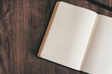 a day planner on a wooden table top view