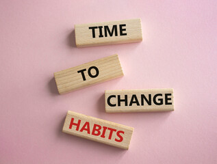 Time to Change Habits symbol. Wooden blocks with words Time to Change Habits. Beautiful pink background. Psychology and Time to Change Habits concept. Copy space.