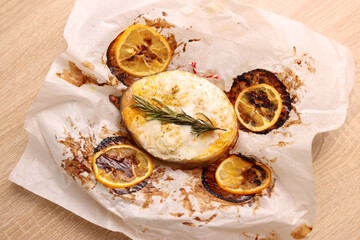 A freshly baked piece of salmon is placed on a plate