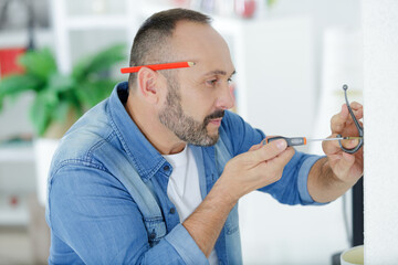 man doing diy at home