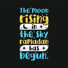 Fototapeta premium The moon rising in the sky ramadan has begun islamic typography tshirt design