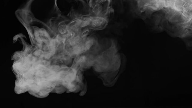 Smoke on a black background. Vape smoke spread