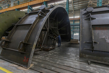 Fototapeta na wymiar Assembling of a low pressure turbine at factory workshop.