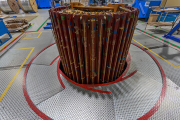 Assembly of transformer core in the factory workshop.