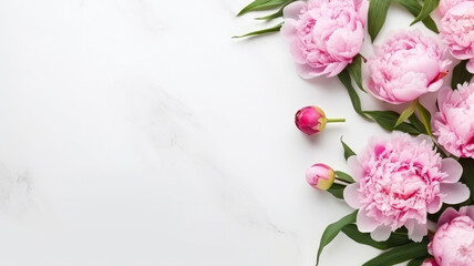 composition of a bouquet of pink peony flowers, top view with copy space on a white background