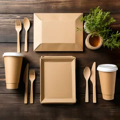 Foto op Plexiglas The concept of zero waste and recycling. Use of eco-friendly paper tableware and packaging made from biodegradable materials Delivered food in eco friendly paper packaging boxes on wooden table © Marietimo