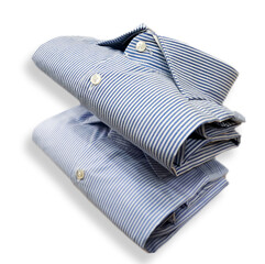 stack of two men's cotton shirts with english stick 
 blue striped shirt and light blue striped shirt isolated on the white background