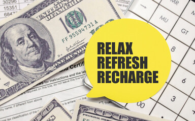 RELAX REFRESH RECHARGE on yellow sticker with pen and calculator