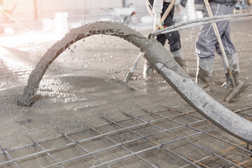 Concrete concreting floors of buildings in construction site. Concept pouring cement to base plate