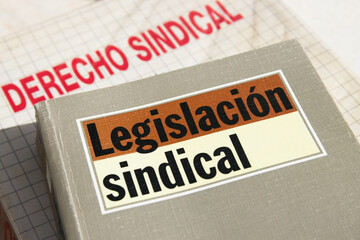 Close-up of the title of some books on labor and union legislation Spanish