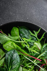 Healthy green salad mix, leaves  juicy snack healthy eating cooking appetizer meal food on the table copy space food background rustic 