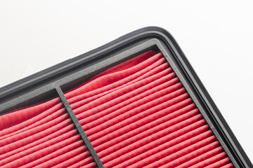 Air filter for internal combustion engine close-up. Paper air filter of car engine isolated on...