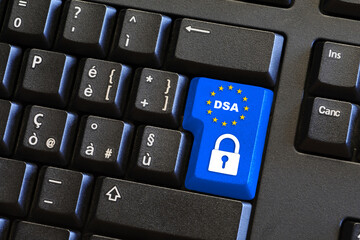 Digital services act (DSA) concept: enter key on computer keyboard with europe flag, padlock symbol and the text "DSA" Digital Services Act