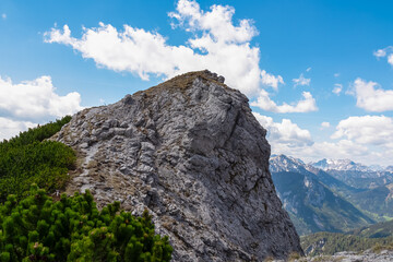 Fototapeta na wymiar Panoramic view of majestic mountain peak Festlbeilstein in Hochschwab mountain range, Styria, Austria, Scenic hiking trail from Karlhochkogel to Sankt Ilgen. Escapism in Austrian Alps. Wanderlust