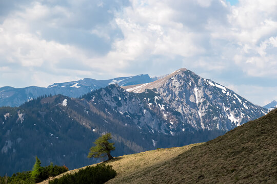 Panoramic view of majestic mountain peak Messnerin in untamed Hochschwab mountain range, Styria, Austria, Scenic hiking trail in remote Austrian Alps in summer. Seen from Karlhochkogel. Wanderlust