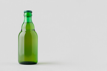 Green steinie beer bottle mockup with copyspace.