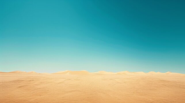 The vastness of a desert landscape, with towering sand dunes stretching to the horizon under a clear blue sky