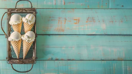 Schilderijen op glas Three ice cream cones in a metal basket on blue wooden vintage background © buraratn