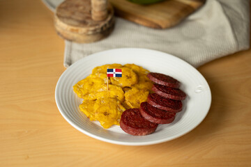 dominican fried plantains and salami with a flag
