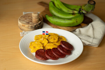 dominican fried plantains and salami with a flag