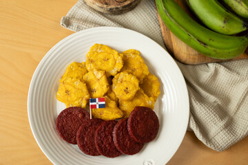 dominican fried plantains and salami with a flag