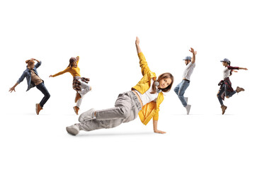 Group of people dancing and a young female in a dance pose on the ground