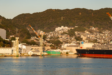 Nagasaki Bay, Nagasaki, Japan on a clear early morning with golden light