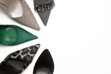 Studio shot of various leather pumps with pointed toes, isolated on white	