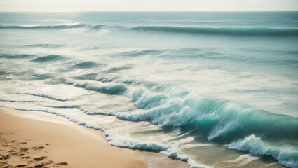 Fototapeta na wymiar Background of beach waves and sandy sea shore. Footprints in the sand.