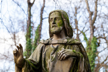 Historic Statue on the mystery old Prague Cemetery, Czech Republic