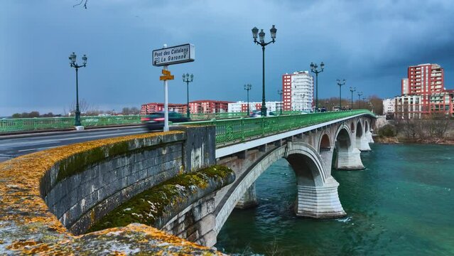Pont des Catalans (Amidonniers bridge) is Toulouse bridge crossing Garonne, France. It is bridge in arch and stone and reinforced concrete inaugurated in 1908, architect Paul Sejourne. Timelapse