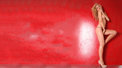 Very sexy blonde on a red background. - obrazy, fototapety, plakaty
