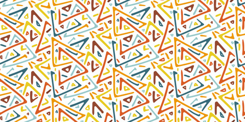 Bright tribal seamless pattern with doodle overlay colorful blue, red and orange triangles. Trendy ethnic geometric texture with hand drawn shapes for textile, wrapping paper, surface, wallpaper