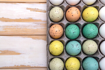 Packing of Easter eggs. View from above. Space for text.