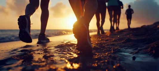  Group of runners exercising on the beach at sunset © BraveSpirit