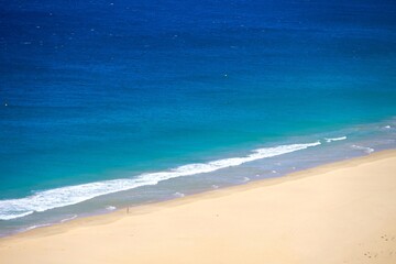 view from a mountain towards a wonderful beach at the Atlantic Ocean, Playa de Atlanterra, Costa de...