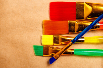 Paint brushes. Background with selective focus and copy space