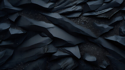 Textured Black Rocks with Glistening Accents. A striking high-resolution image of textured black rocks with subtle glistening elements, perfect for dramatic backgrounds or graphic design 
