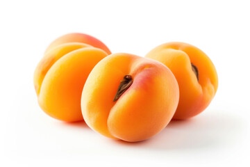 A close-up image of three fresh, ripe apricots with a rich color gradient from yellow to red, isolated on a white background.