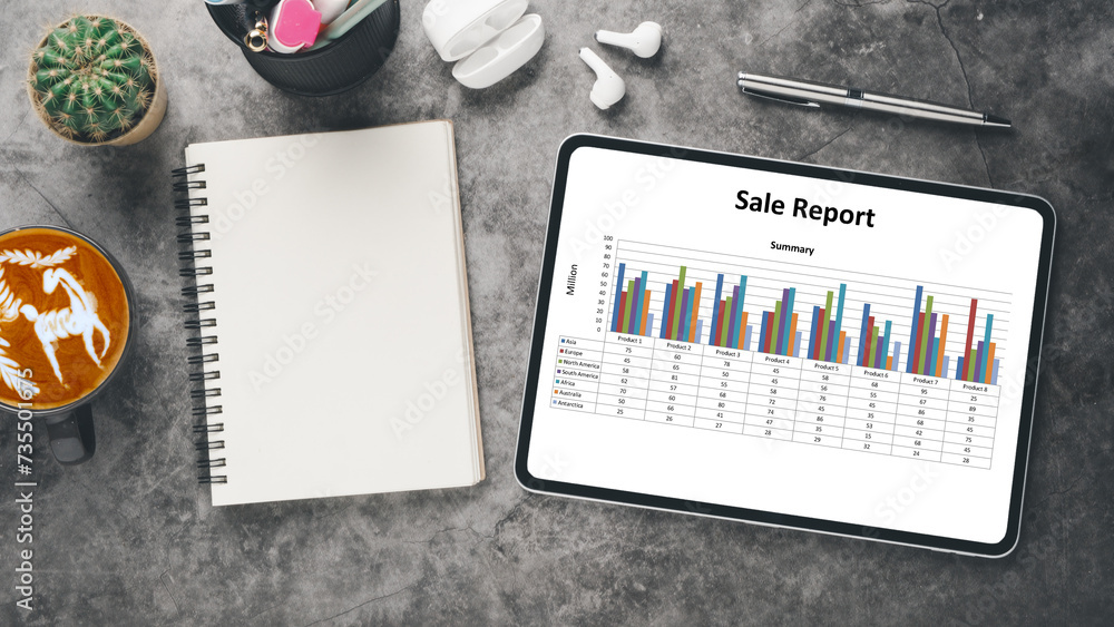 Poster business analytics concept, modern tablet displaying a vibrant sales report with bar graphs on a des