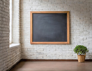 Blank blackboard on white brick wall in empty room